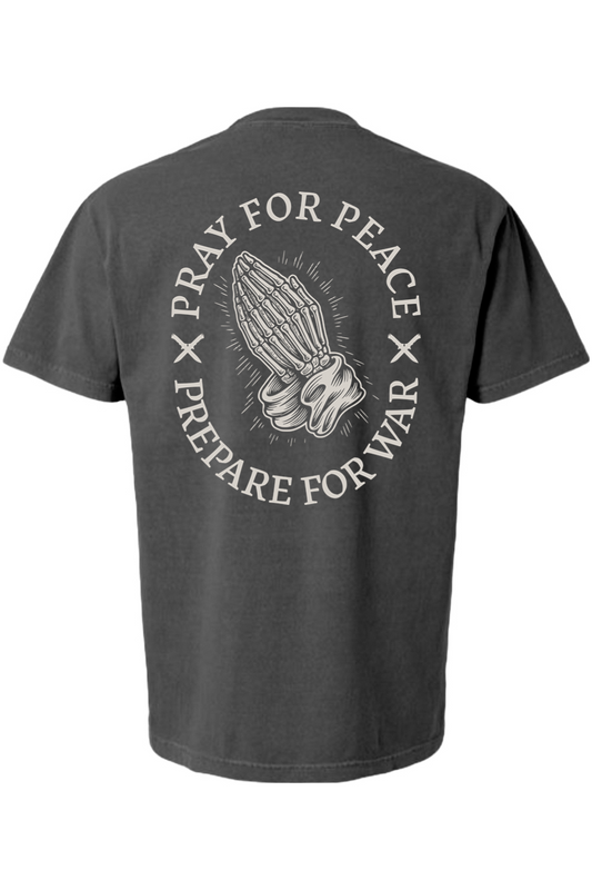 Back view of black Pray for Peace t-shirt with skeletal praying hands graphic and “Pray for Peace, Prepare for War” text.
