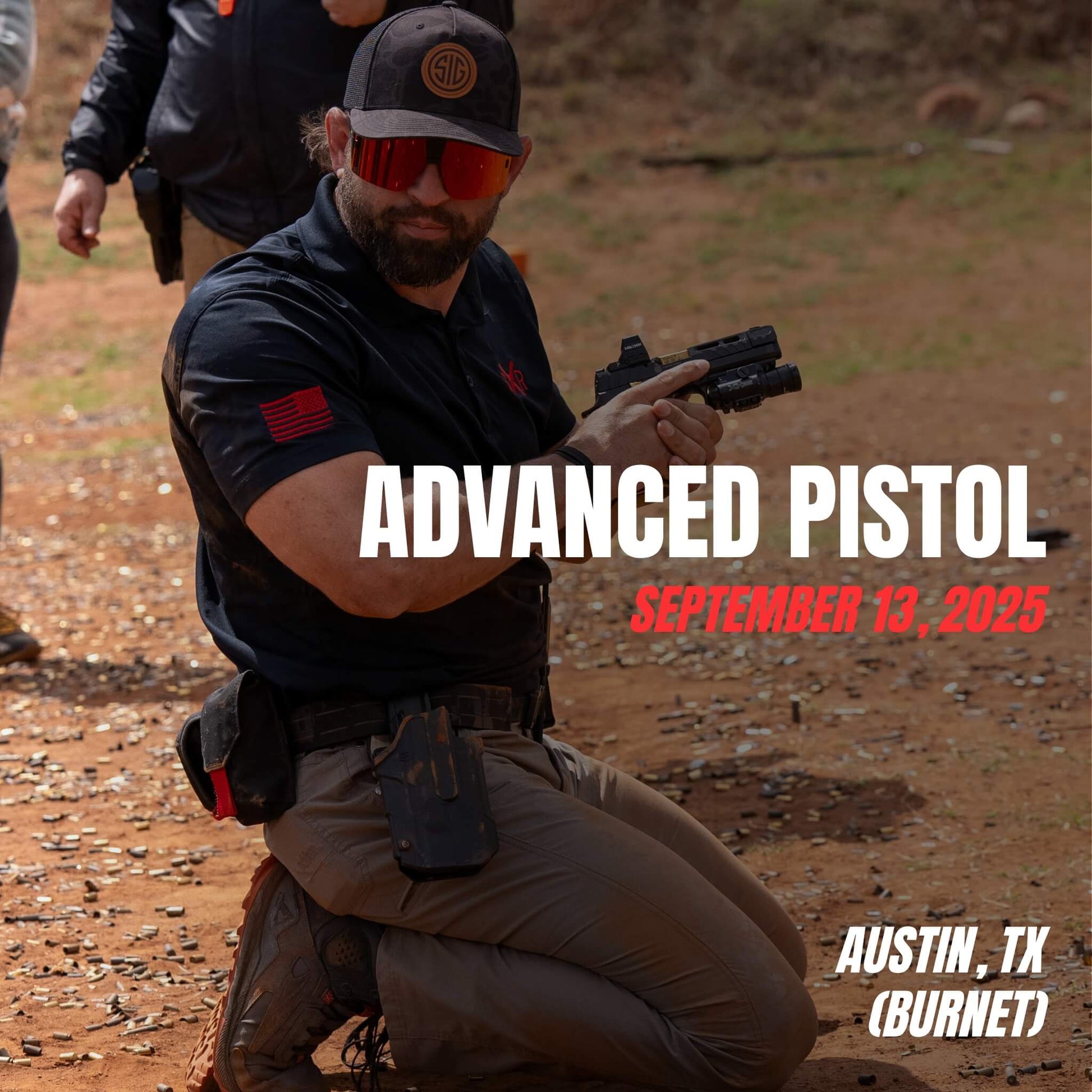Shooter in tactical gear kneeling with pistol drawn at Sheepdog Response Advanced Pistol course in Burnet, TX, held on September 13, 2025.